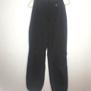 Obermeyer, ladies size 8, pull on black ski pants w/elastic waist.